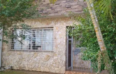Casa com 3 quartos à venda na Rua Mata Coelho, 398, Nonoai, Porto Alegre