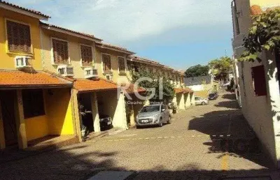 Casa em condomínio no partenon de 3 dormitórios e vaga
