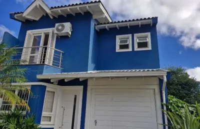 Casa em condomínio fechado com 163 m² de área útil, portaria 24 h e todo confort