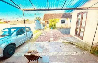 Casa com 4 quartos à venda na Rua Padre João Batista Reus, 3220, Camaquã, Porto Alegre