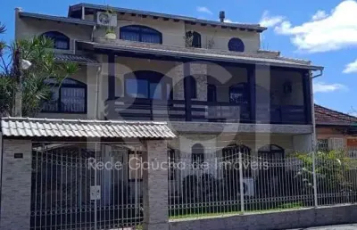 Casa para venda - 750m², 6 dormitórios, sendo 3 suites, 4 vagas - partenon