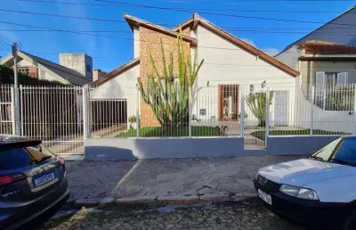 Casa com 6 quartos à venda na Rua Paissandu, 298, Partenon, Porto Alegre
