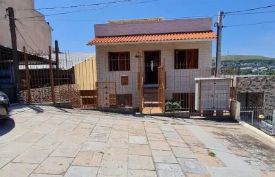 Casa com 2 quartos à venda na Rua Martim Minaberry, 405, Partenon, Porto Alegre