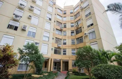 Apartamento de 1 dormitório, living, cozinha, área de serviço e banheiro social.
