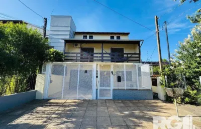 Casa com 4 quartos à venda na Rua Hermínio Bittencourt, 58, Hípica, Porto Alegre
