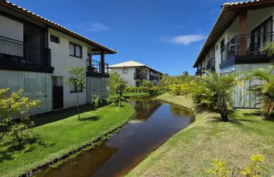 Casa garden à venda – praia do forte | vila do lago | 2 quartos (1 suíte) | mobiliado | garden privativo | frente lago | térreo | nascente