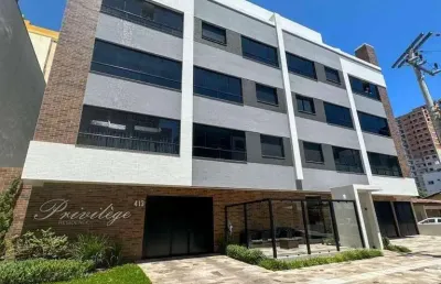 Apartamento para venda em tramandaí, centro, 2 dormitórios, 1 suíte, 2 banheiros, 1 vaga