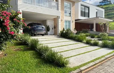 Casa alto padrão em itajaí em condomínio fechado com 4 suites