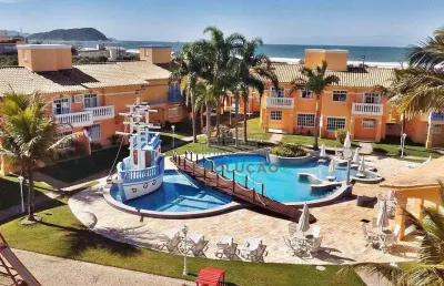 Ótima casa, num condomínio fechado a 100 metros da praia de palmas.