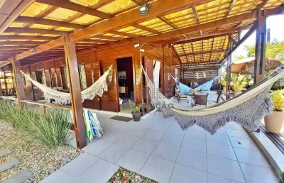 Casa de esquina, 3 dormitórios, sendo 1 suíte, 4 vagas de garagens, próximo ao mar, praia de fora, palhoça/sc