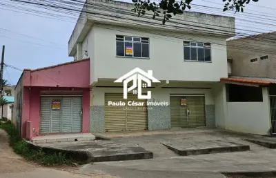 Prédio composto por: 03 lojas com banheiros e um apartamento composto por, 02 quartos, 02 banheiros, copa, cozinha, sala, área de serviço, garagem e u