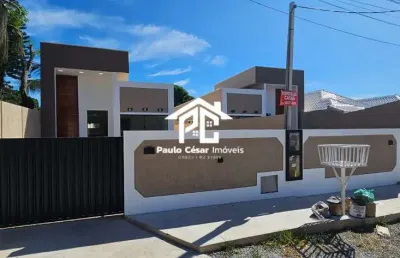Casa à venda em araruama-rj, bairro coqueiral: 2 quartos, 1 suíte, 1 sala, 1 banheiro, 1 vaga de garagem, 65m² de área.