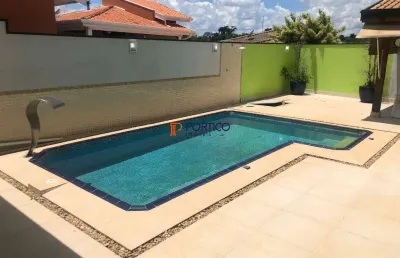 Locação em condomínio com 4 suítes e piscina, em paulínia