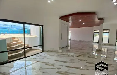 Ampla cobertura com terraço gourmet e vista total ao mar!