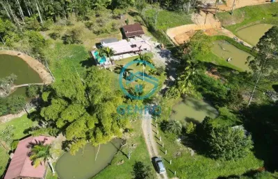 Chácara em meio a natureza com piscina, 02 lagoas e com terreno de 9.100m² à venda em tijucas/sc