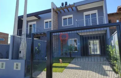 Sobrado com 3 dormitórios à venda, 112 m² por r$ 630.000,00 - girassol - gravataí/rs