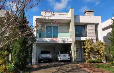 Sobrado com 3 dormitórios para alugar, 329 m² por r$ 15.700,00/mês - alphaville - gravataí/rs