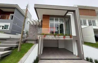 Casa com 3 dormitórios à venda, 220 m² por r$ 2.190.000,00 - alphaville - gravataí/rs