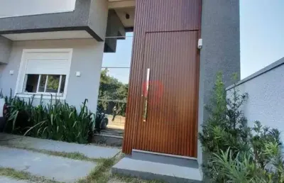 Casa com 3 dormitórios à venda, 90 m² por r$ 630.000,00 - reserva bela vista - gravataí/rs