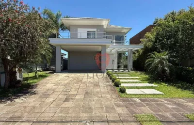 Casa com 3 dormitórios para alugar, 260 m² por r$ 16.240,00/mês - alphaville - gravataí/rs