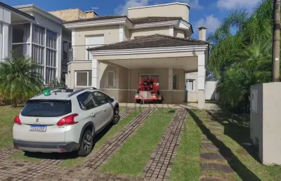 Casa com 3 dormitórios, 220 m² - venda por r$ 2.200.000,00 ou aluguel por r$ 10.178,52 - alphaville - gravataí/rs