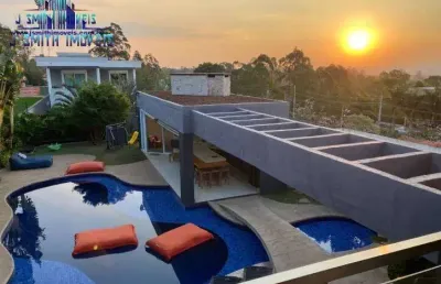Casa espetacular, 4 suítes, piscina aquecida, área gourmet. aconchegante!!