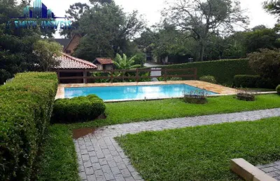 Casa térrea 633m². bolsão c/ portaria na granja viana. piscina, at. 1.278m²