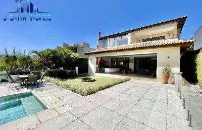 Casa c/ renda.  6 suítes (4 + 2 apto. hóspedes), piscina, gourmet, linda.
