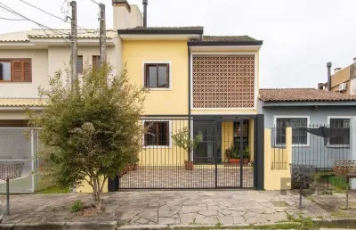 Casa com 3 quartos à venda na Rua Eva Pinto, 114, Hípica, Porto Alegre