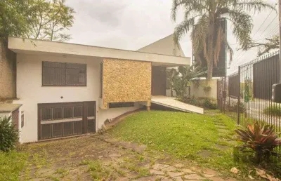 Casa com 4 quartos para alugar na Rua Carlos Huber, 580, Três Figueiras, Porto Alegre