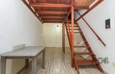 Apartamento estilo stúdio com mezanino de 1 dormitório, partenon