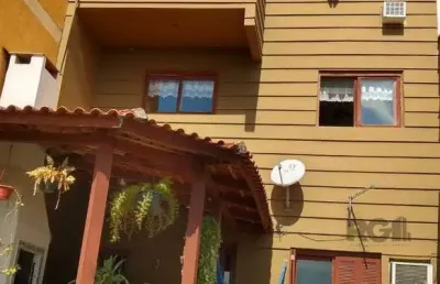 Casa com 4 quartos à venda na Rua Professor Antônio José Remião, 300, Espírito Santo, Porto Alegre