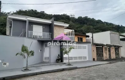 Casa com 5 dormitórios à venda, 373 m² por r$ 1.690.000,00 - sumaré - caraguatatuba/sp