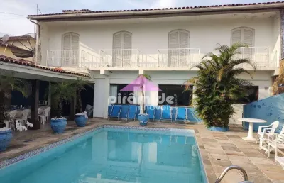Casa com 5 dormitórios à venda, 393 m² por r$ 2.500.000,00 - indaiá - caraguatatuba/sp