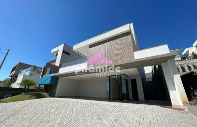 Casa com 4 dormitórios à venda, 298 m² por r$ 2.650.000,00 - condomínio residencial jaguary - são j