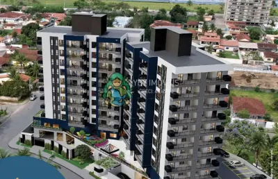 Lançamento com uma suíte à venda, 350 metros da praia, porto novo, caraguatatuba, sp