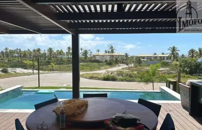 Linda casa térrea, com vista para o mar e 4 confortáveis suítes no imbassaí privilege !