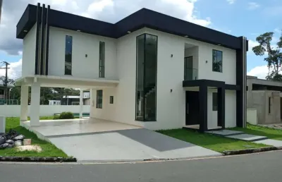 Casa duplex espetacular com 4 suítes  no condominio reserva parque - ponta negra. financia!