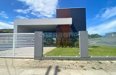 Casa em condomínio fechado com 3 quartos à venda na avenida jovelino pacheco dos santos, 149, camboim, arroio do sal por r$ 950.000