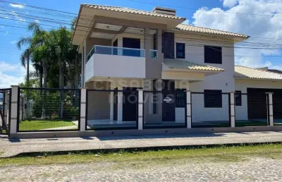 Casa com 4 quartos à venda na rua sete de setembro, 103, centro, arroio do sal por r$ 1.500.000