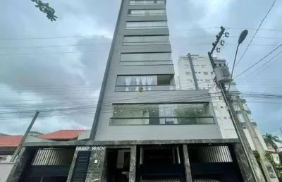 Apartamento 3 dormitórios e 2 vagas, mobiliado com vista mar