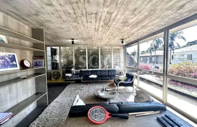 Casa no morumbi e terreno anexo . projeto ruy otake em concreto aparente