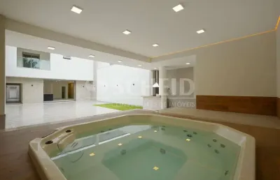 Casa a venda com 607 m² 4 quartos sendo 4 suítes, 6 vagas