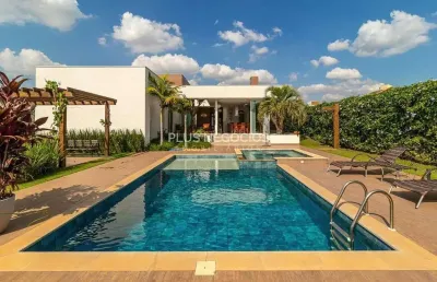 Casa à venda de alto padrão no condomínio saint charbel – 4 suítes, piscina com hidro e área gourme