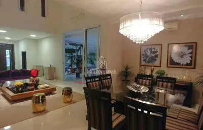 Casa à venda, no alphaville i,com 04 suites e aquecimento solar  localizado no bairro jardim itália