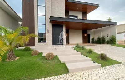 Casa em condomínio à venda no condomínio florais itália, sendo 3 suítes, 4 vagas de garagem, cuiabá