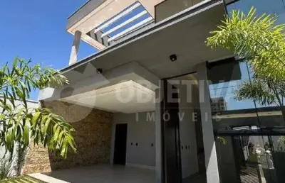 Excelente casa nova de alto padrão a venda no bairro planejado praça alto umuarama em uberlândia