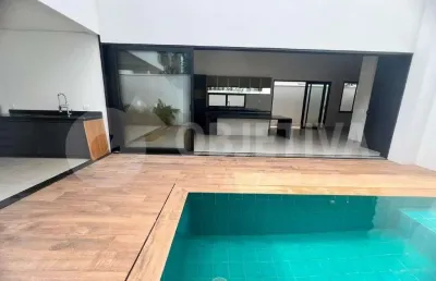 Excelente casa a venda no condomínio fechado de alto padrão splendido em uberlândia