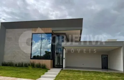Encantadora casa térrea disponível para venda no conceituado condomínio arts em uberlândia