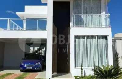Casa estilo sobrado disponível para venda no condomínio reserva dos ipês em uberlândia